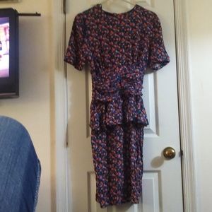 Erikas Place,division of diamonds run ltd.Size 9/10.i believe it is vintage.